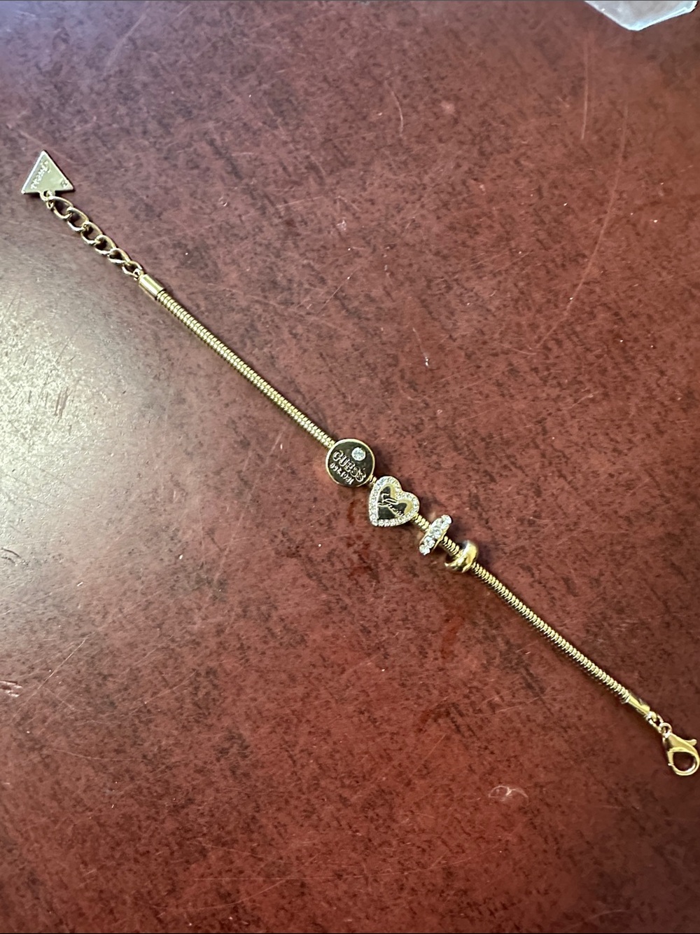 Guess by Marciano Gold and Crystal Heart Charm Bracelet